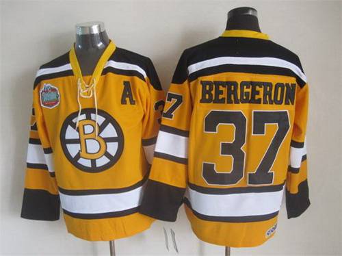 Men's Boston Bruins #37 Patrice Bergeron 2009-10 Yellow CCM Vintage Throwback Jersey